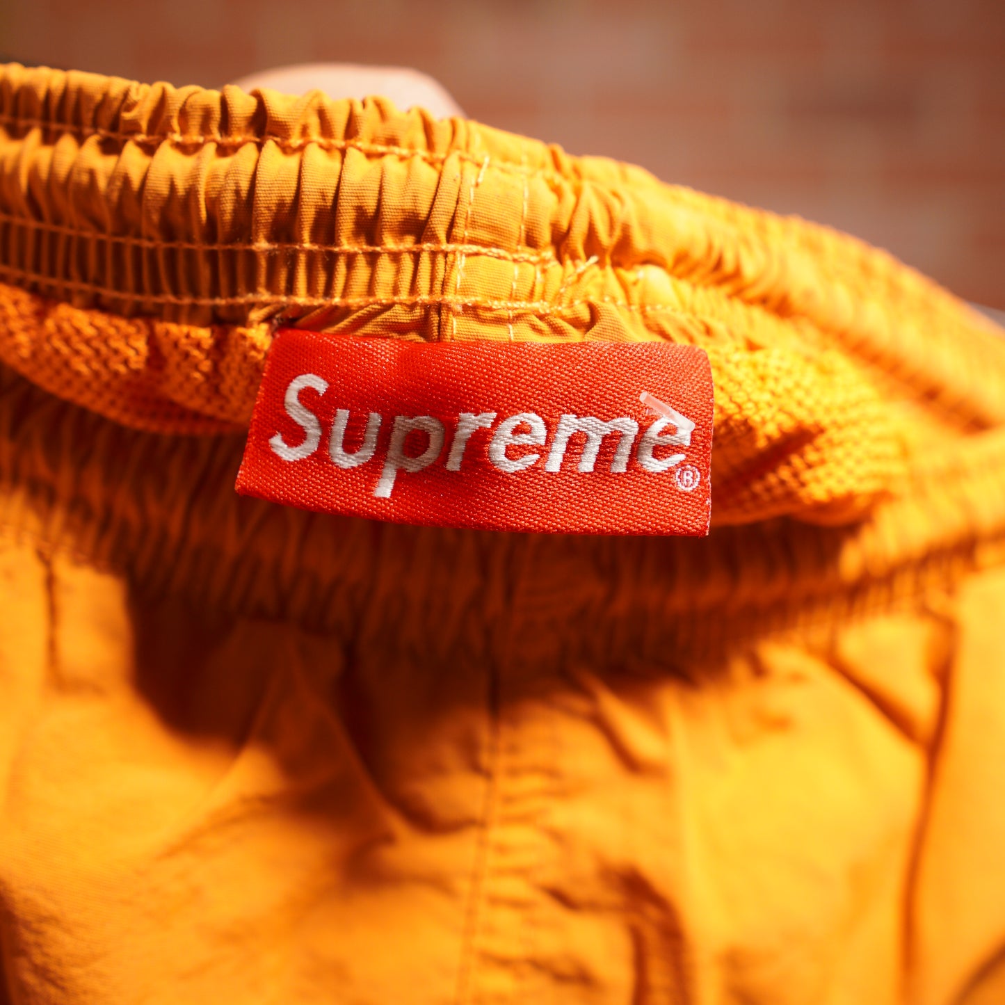 Supreme Orange Swim Trunks